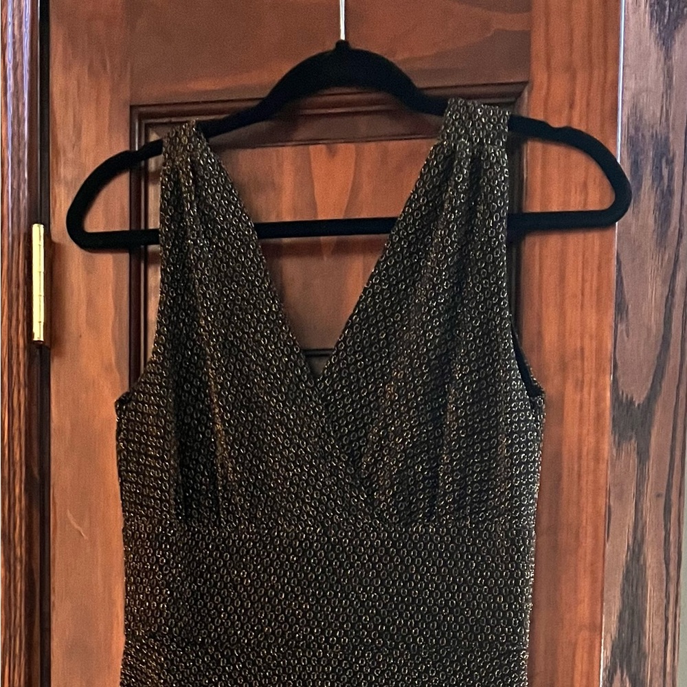 Black and Gold dress. Great for a night out! Mid length. Only worn once.
